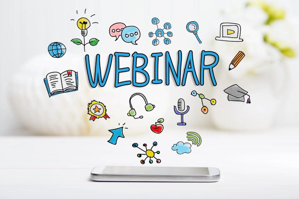 a phone with drawings of various icons flying out of it